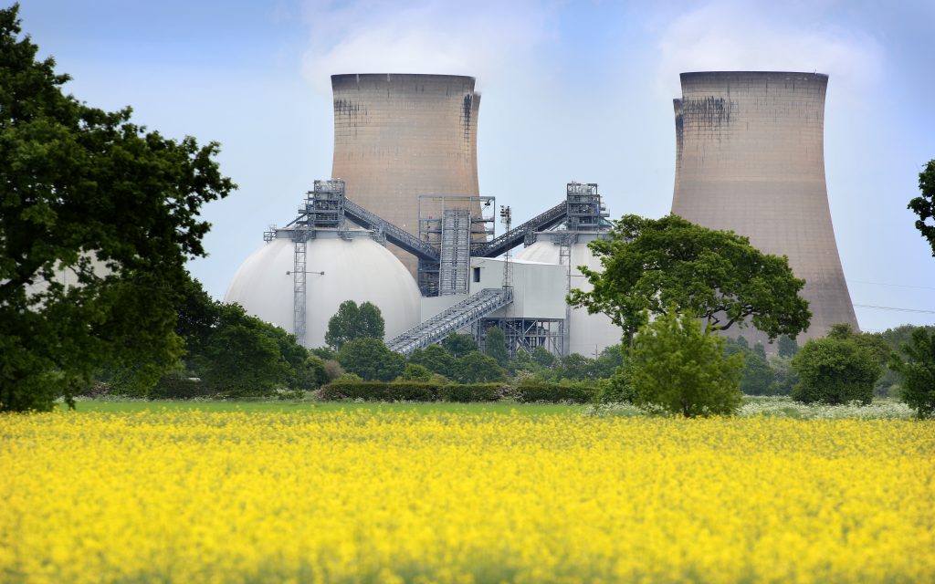 Biomass storage domes and water cooling towers at Drax Power Station in North Yorkshire