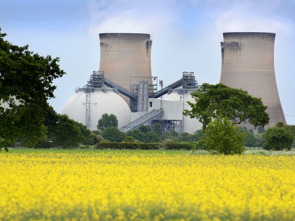 Biomass storage domes and water cooling towers at Drax Power Station in North Yorkshire