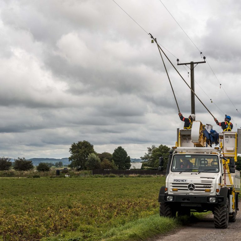 Engineers from Electricity North West fixing electricity wires.