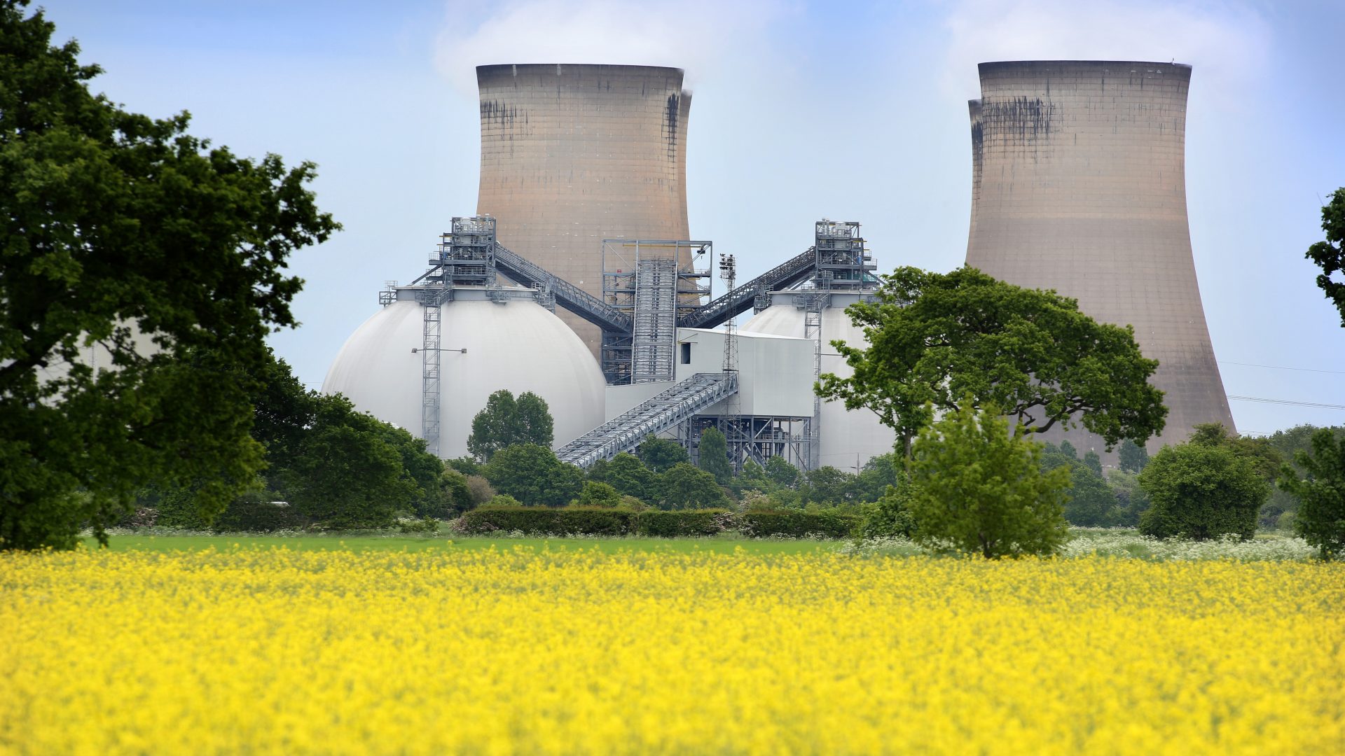 Biomass storage domes and water cooling towers at Drax Power Station in North Yorkshire